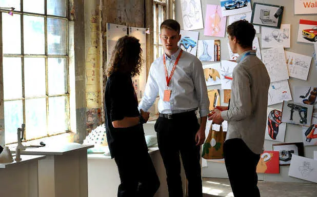 Three students exchanging ideas at the Made in Brunel ideas factory