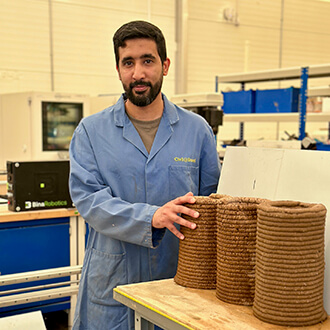 Dr Abdulrahman Albar with 3D printed concrete samples