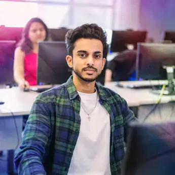 student in a computer lab