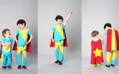 image of Children fly through surgery in new superhero gowns