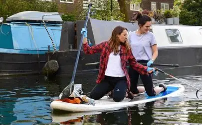 image of Clean a canal by paddleboard at Plastic Oceans Festival