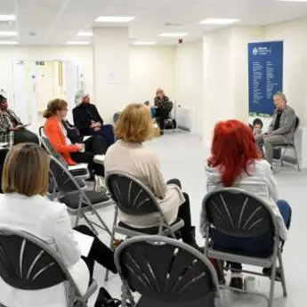 Audience members at a Community Conversations event