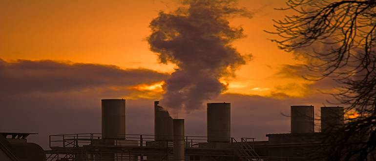 industrial chimneys at dawn